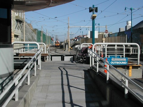 Looking toward Mint Yard.  This end of the tracks is used by Muni to park disabled LRVs.  The yellow thing in the background is a rail capable small truck (Unimog)
